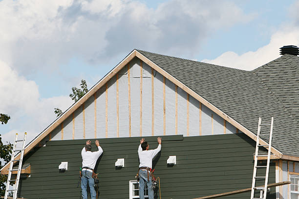 Professional Siding technician working in Evans City, PA